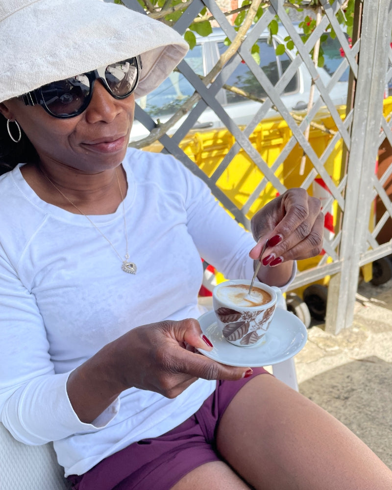 Melicent enjoys a fresh roasted coffee pod