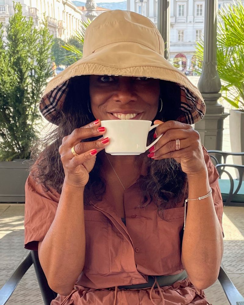 Melicent enjoys Peak Flavor coffee