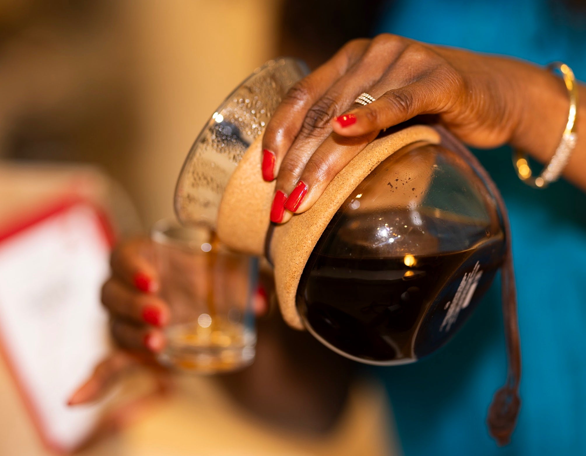 Melicent uses a Bodum pour over coffee maker