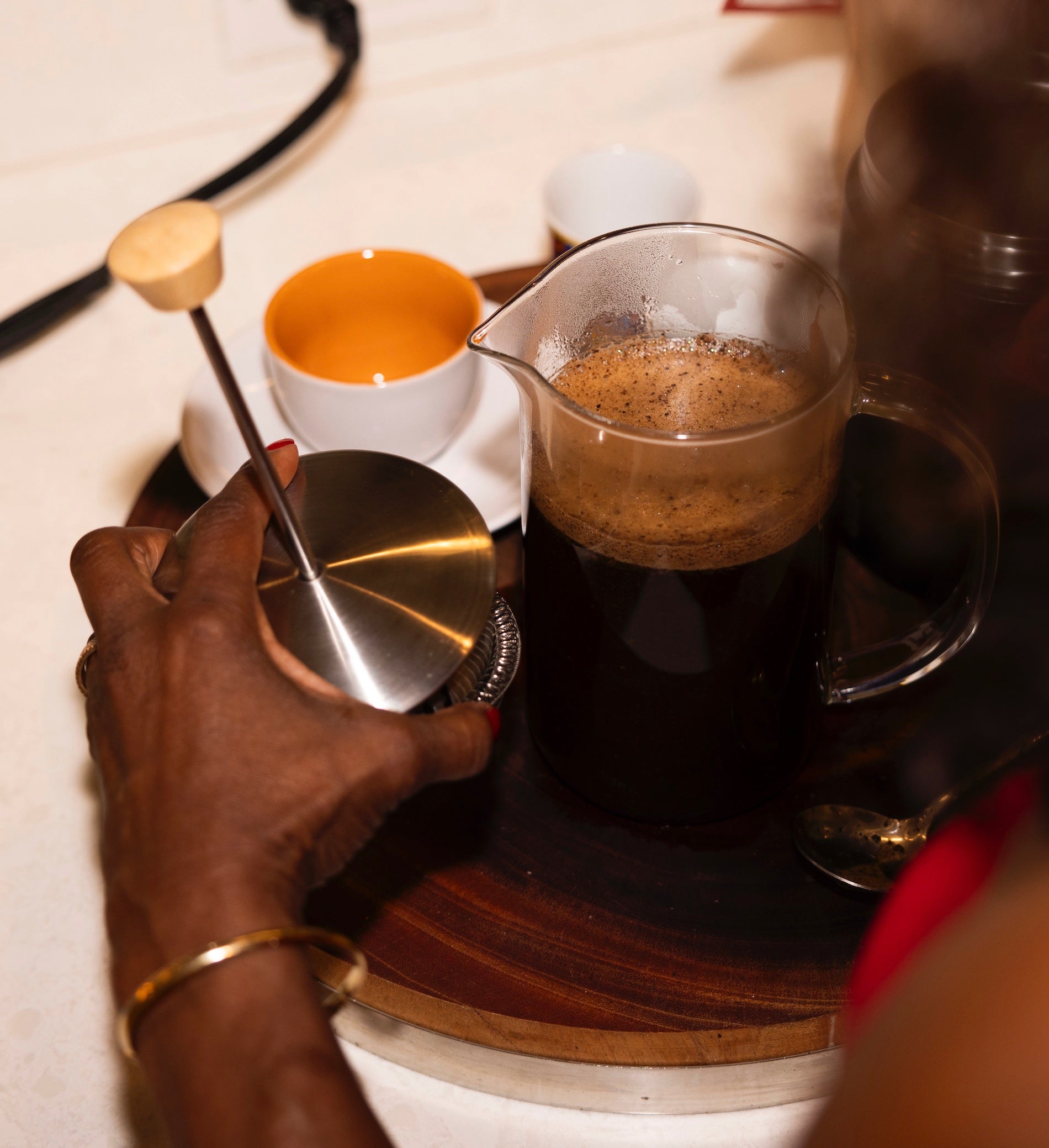 Melicent brews rich and full-bodied french press coffee