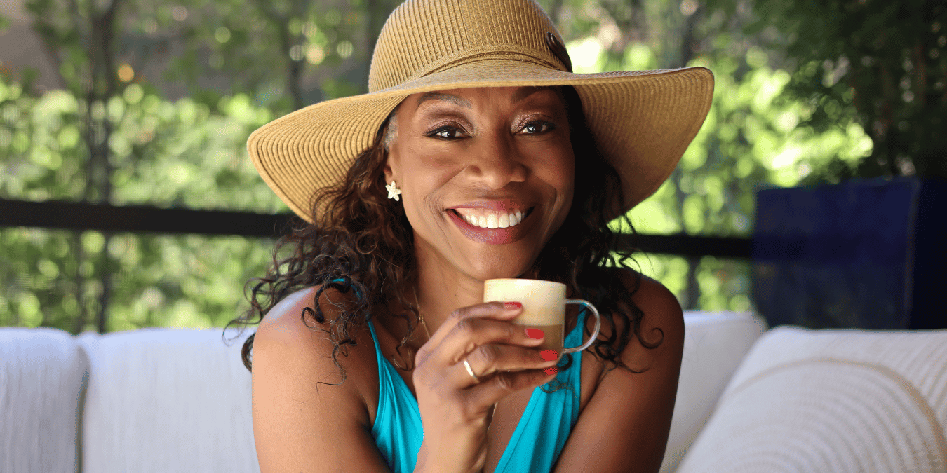 Melicent indulges in Fresh Roasted Peak Flavor Coffee.