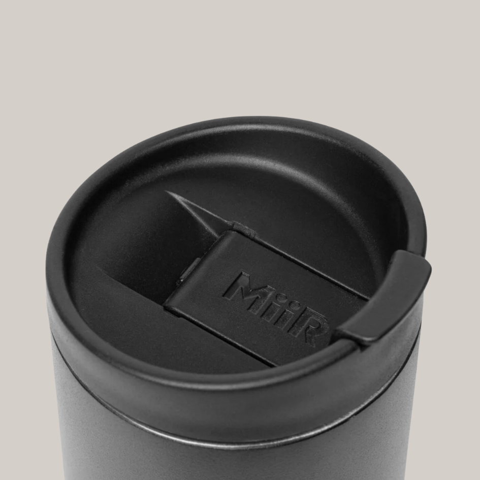 The Peak Flavor Miir traveler has a flip top to prevent spilling