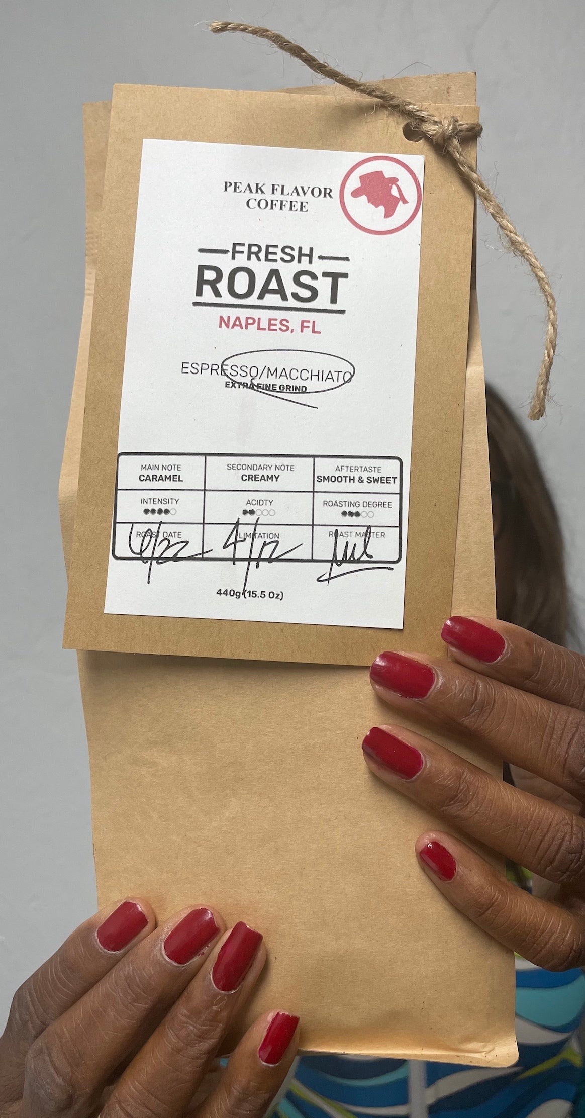 Melicent holds Italian Macchiato Grounds