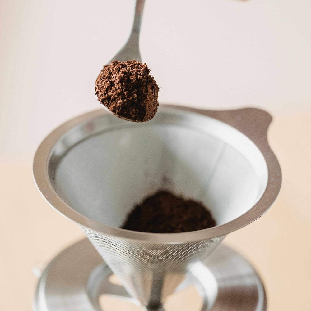 Grinds in metal mesh filter Pour Over