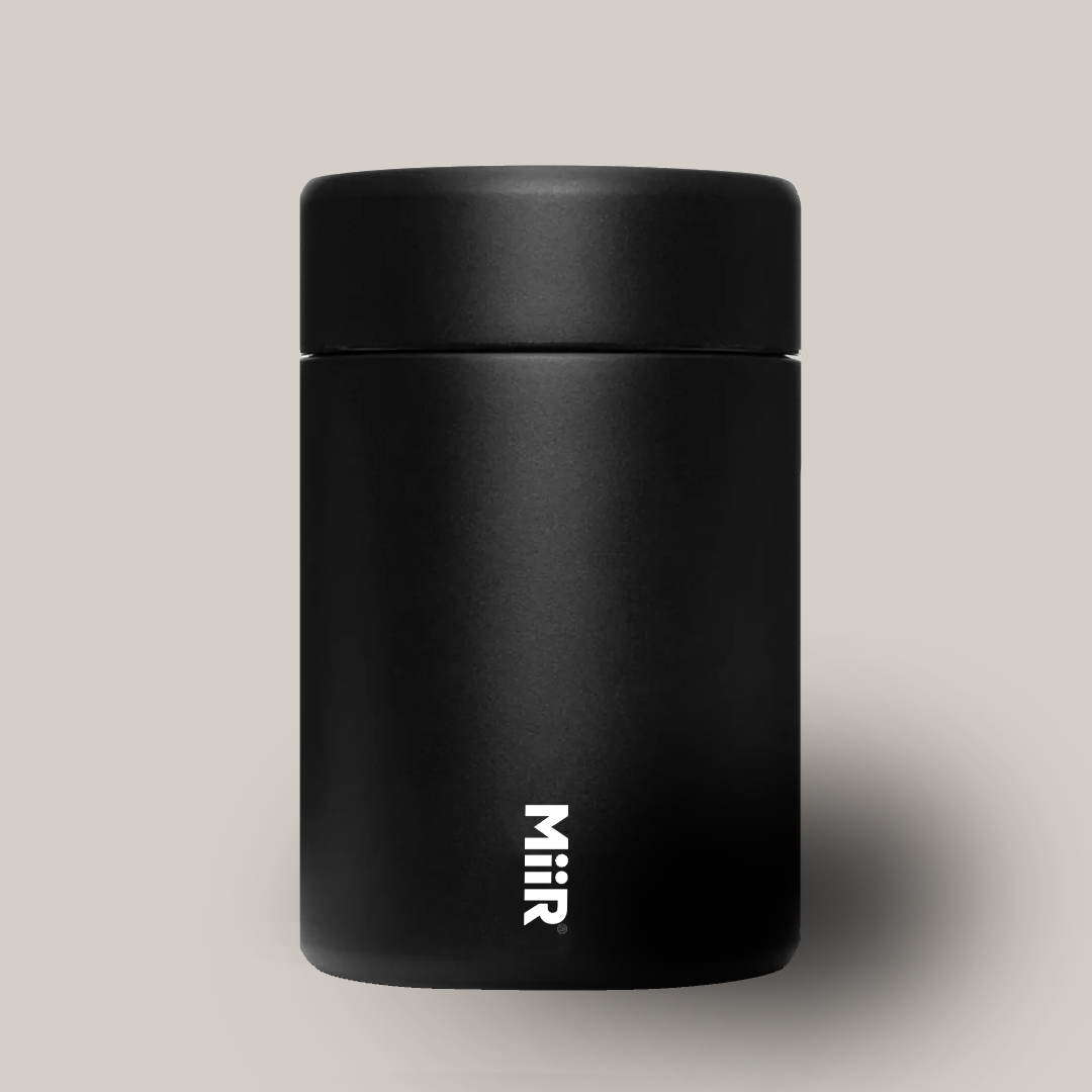 A Miir Coffee Canister helps keep Peak Flavor Coffee fresh